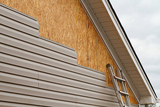 Professional Emergency Siding Repair technician working in Marion, NC